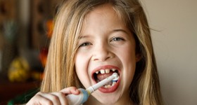 Brushing with the Oral B Deep Sweep Toothbrush